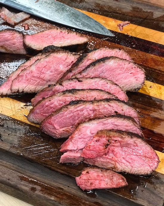 Slices of this roast on a cutting board. 