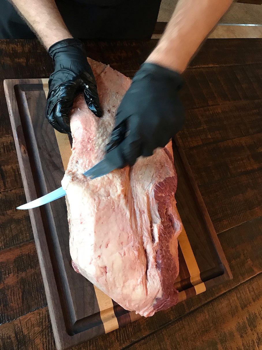 Trimming the brisket while it's cold is best.
