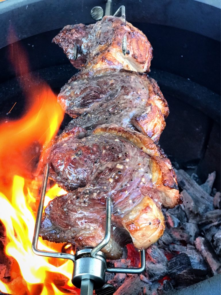 Picanha cooking up over them coals.