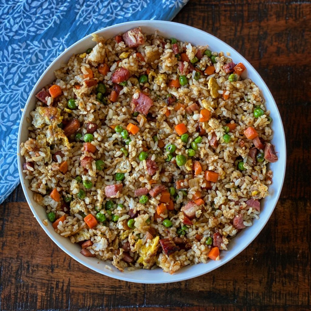 Ham fried rice in a large bowl and ready to serve.