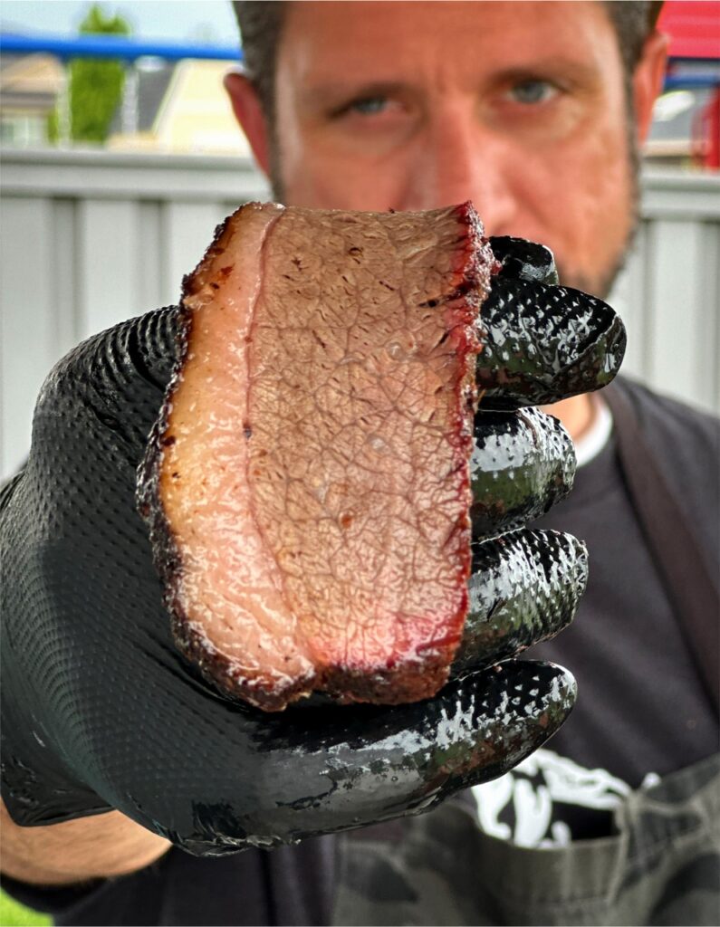 Smoked brisket passing the bend test. 